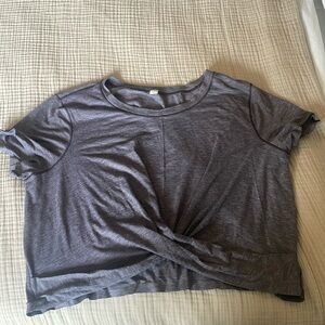 Purple cropped and rouged Lululemon t-shirt